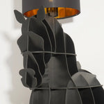 Close-up of Tete Horse Floor Lamp showing layered horse-shaped frame and matte black finish