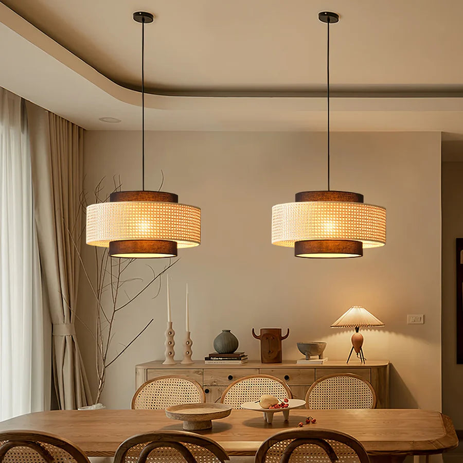 soft glow from tiered drum pendant light fills the home dining space with relaxing daily ambiance
