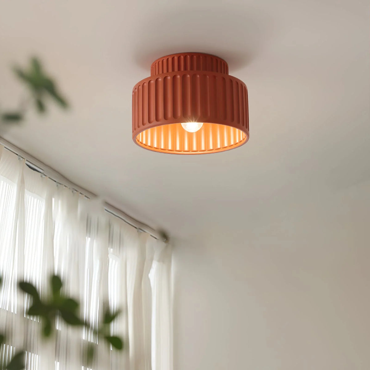 the close up of Tristan_Flush_Mount_Ceiling_Light_with red