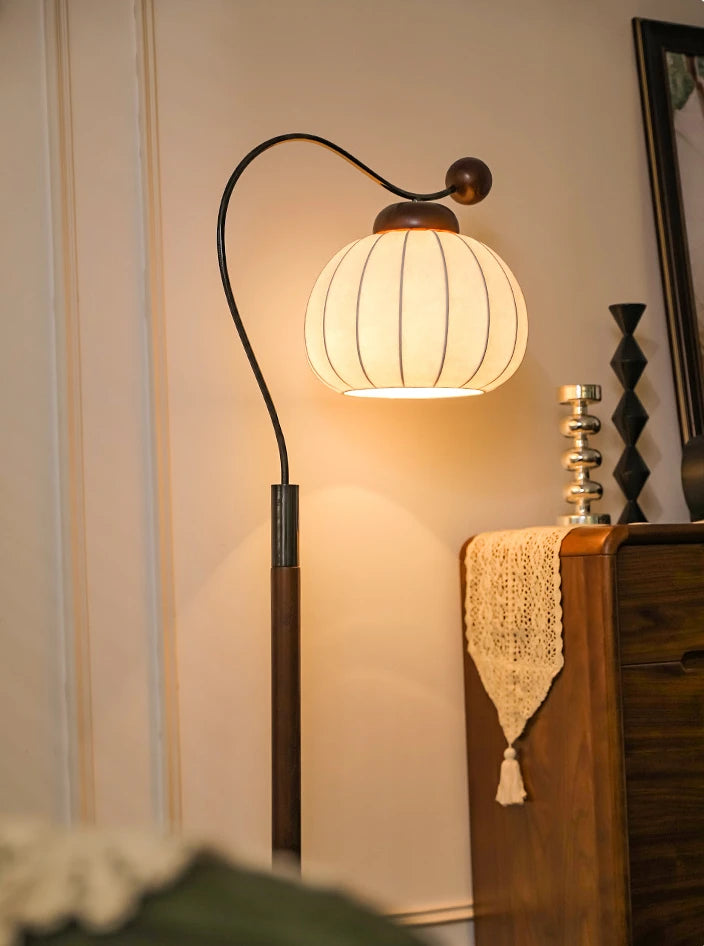 Upgrade your decor with this Retro Pumpkin Floor Lamp: a statement piece for living rooms and reading nooks.