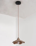wavy cement pendant light presents organic curved form ideal for modern minimalist home